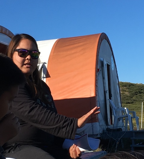 TSSRAP student Allison Wetrade sharing traditional stories from her home community with students at the Tundra Science and Culture Camp.  Photo: GNWT / T.Stephenson, ENR